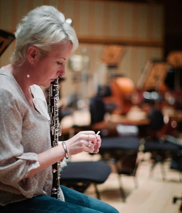 What do titanium and a garage have to do with SSO Principal Oboe, Rachel Walker?
